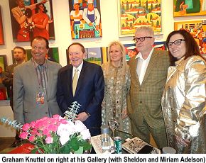 Graham Knuttel at his gallery with Sheldon and Miriam Adelson